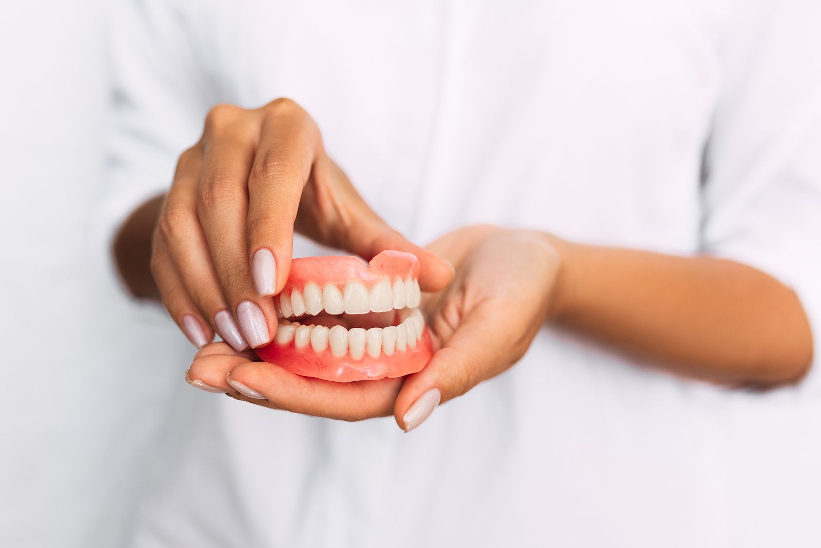 How do I have to clean my removable denture?